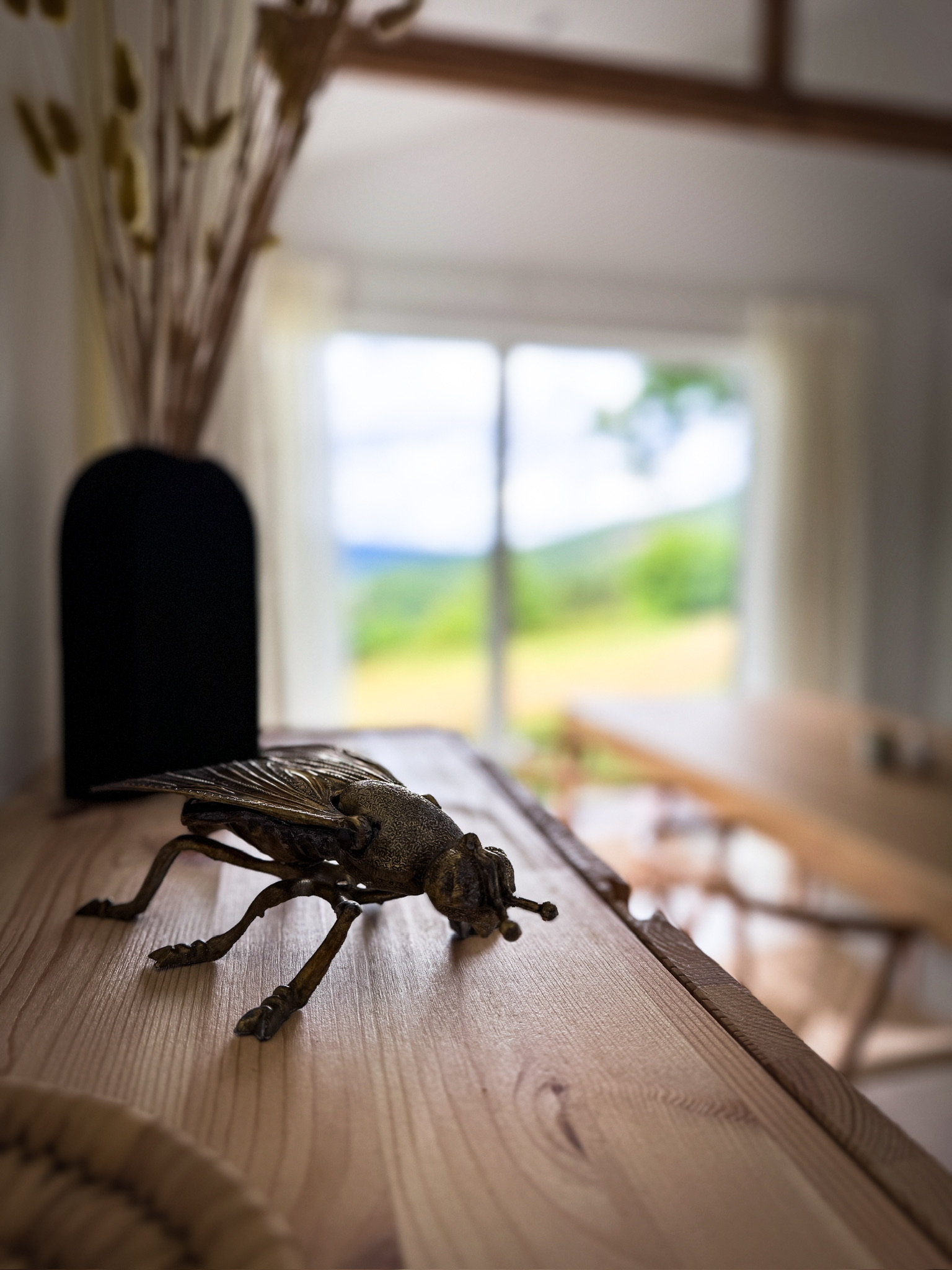 Decorative cicada table detail