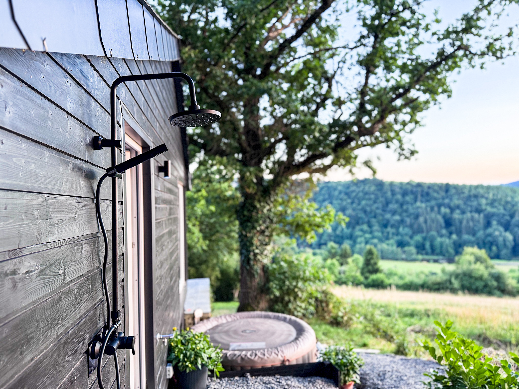 Outdoor shower with mountain view